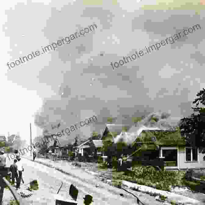 A Black And White Photograph Depicting The Burning Of Tulsa's Greenwood District During The 1921 Race Riot. Death In A Promised Land: The Tulsa Race Riot Of 1921