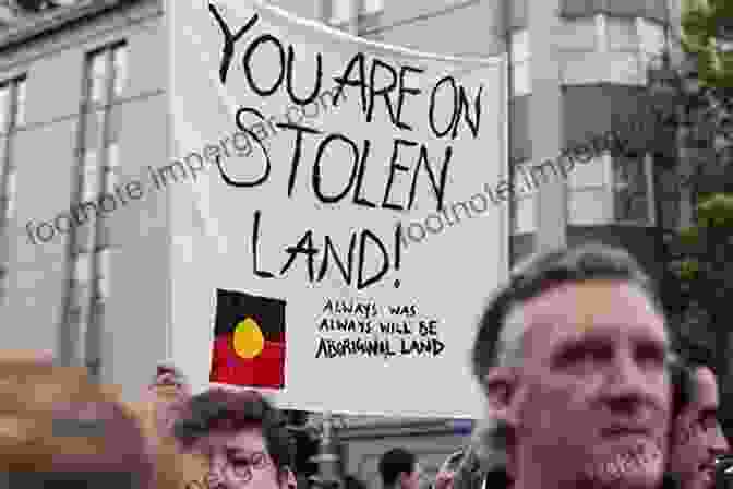 A Photograph Of Indigenous Protesters Holding Signs Demanding Land Rights. Lethal Legacy: Current Native Controversies In Canada