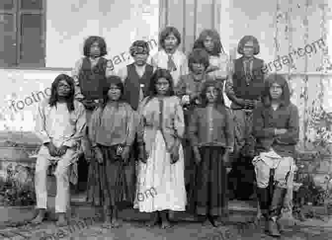 A Somber Photograph Of Indigenous Children Outside A Residential School. Lethal Legacy: Current Native Controversies In Canada