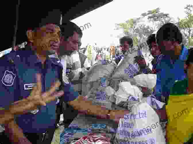 Aid Workers Distributing Supplies To Cyclone Victims Catalyst: In The Wake Of The Great Bhola Cyclone