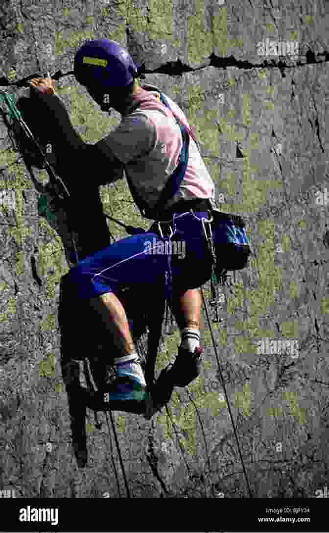 Black And White Photograph Of A Mountaineer Scaling A Steep Rock Face. The Alps Jackie Speicher