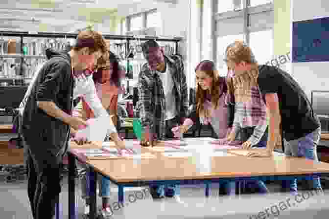 Diverse Group Of Students Working Together On A Project In A Classroom The Art Of Coaching: Effective Strategies For School Transformation