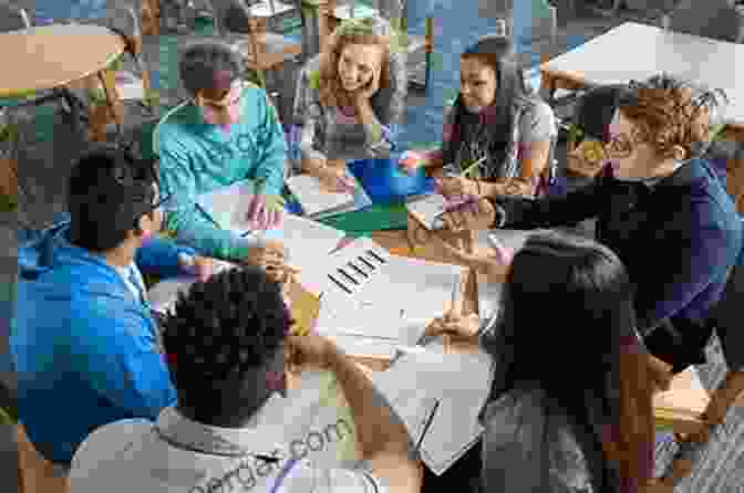 Educator Leading A Discussion With Students In A Small Group Setting The Art Of Coaching: Effective Strategies For School Transformation